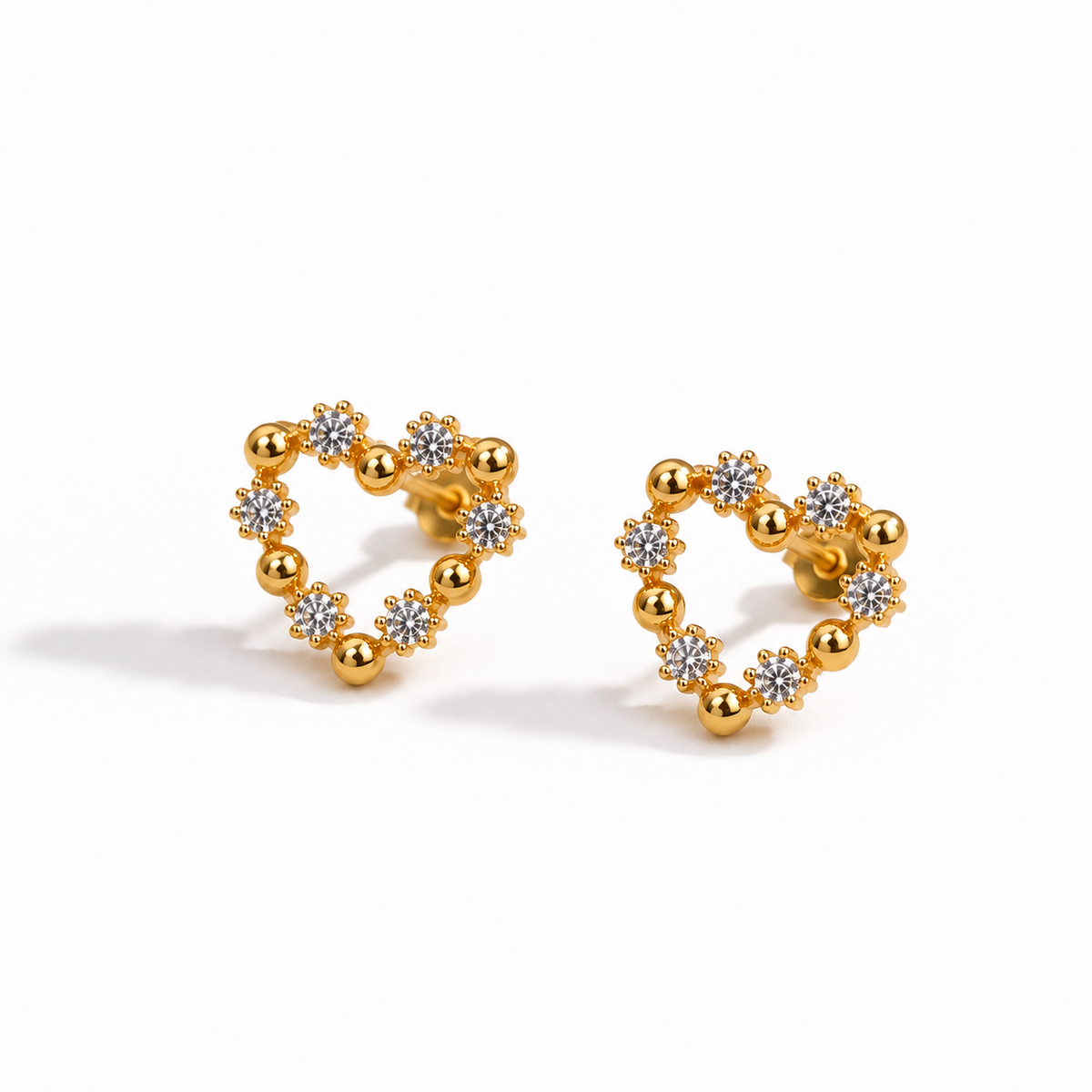 Miayaa Swirl Heart Studs – white background